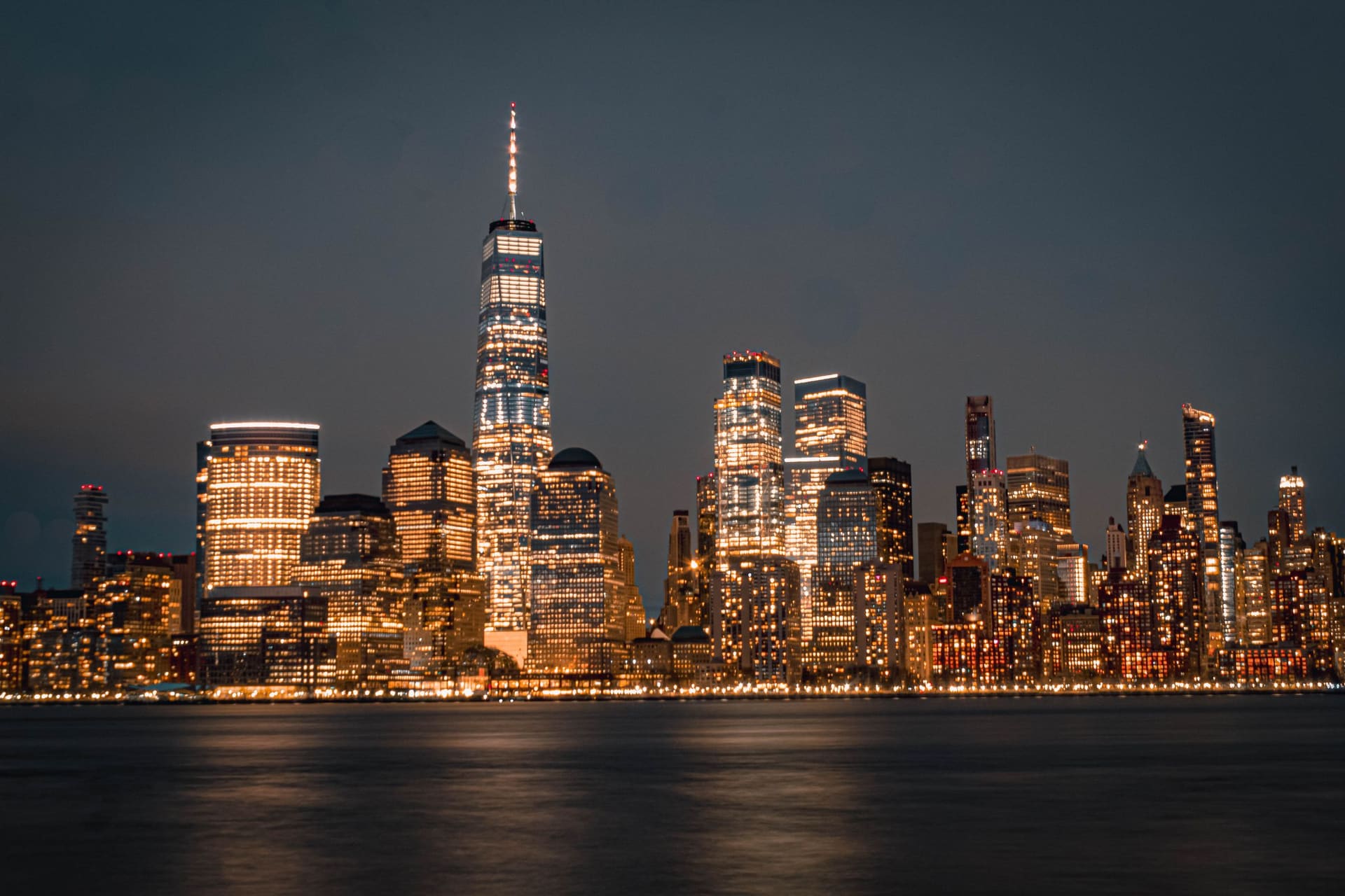 Manhattan skyline across the Hudson River at night