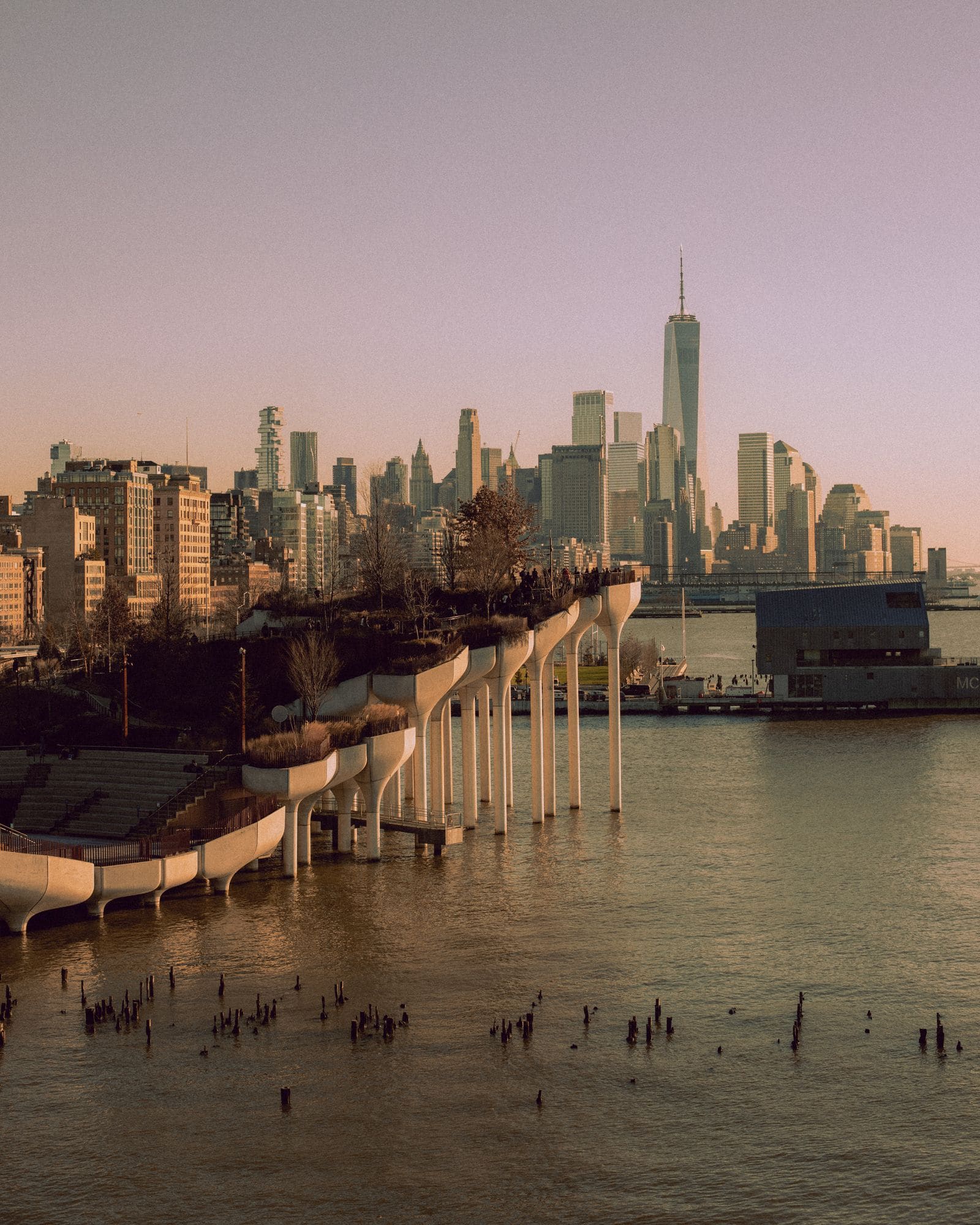 Manhattan skyline across the Hudson River at sunset